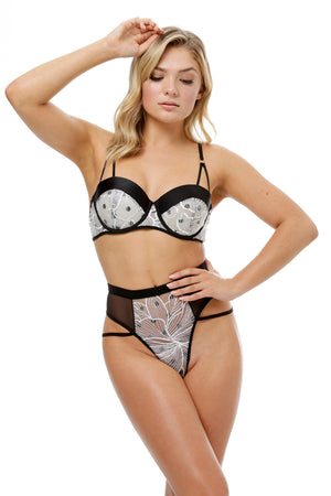 model wears lace push up bra and high waist underwear
