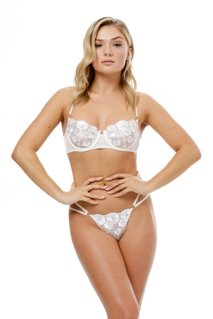 model wears white lace balcomette bra lingerie