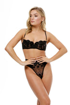model wears black lace underwear balconette bra and high-waist underwear 